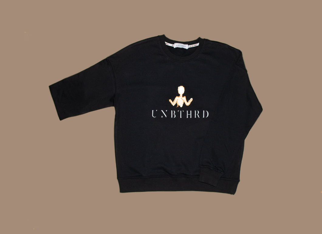 UNBOTHERED FULL LOGO SWEATSHIRT. OVERSIZED UNISEX SWEATSHIRT BLACK. 